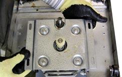 Mark the position of the motor on the shaft plate. 3. Remove the four 7/16-in.