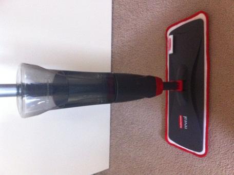 2 Overall Description The Reveal Spray Mop is grey and red in colour and made of plastic, metal, and microfiber (see Figure 1).