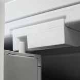 The pin on top of the mullion and the track, located at the top center front of the refrigerator,