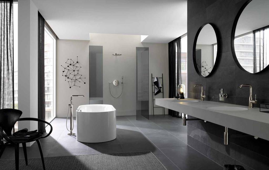 GROHE ESSENCE BATHROOM 32 628 BE1 L-Size Basin mixer See page 25 Floormounted bath/shower mixer See page 28 Simply beautiful. This elegant freestanding bath mixer is the embodiment of modern luxury.