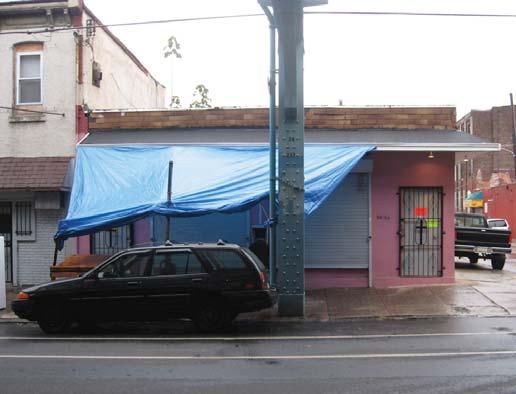 Case Study: Single Story Building Before: Retractable awning provides cover for merchandise and pedestrians outside of the store.