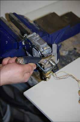 Do not over tighten the vice. Remove the Flare Fitting from the gas outlet side of the valve.