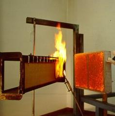 The sample is exposed to a small pilot flame and radiant panel. The position of the sample is varied to simulate end use in floors, walls and ceilings.
