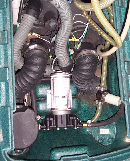 FLUSH SOLUTION TANK AND PUMP: (continued from previous page) Direct the end of the prime hose into the recovery tank vacuum barb CLEAN PUMP INLET FILTER Vacuum