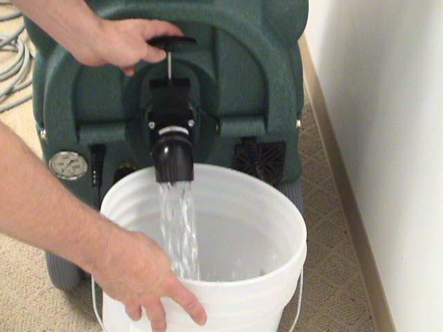 Place Chemical Feed Hose into Rinse Solution Connect the other end of the hose to a water faucet and turn on the water.