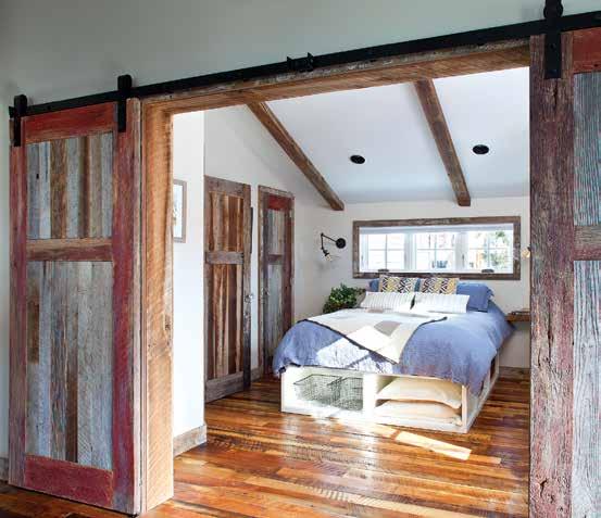 CLOCKWISE FROM TOP LEFT: A queen-sized Pottery Barn bed with built-in storage space anchors the cabin s only bedroom. Schoolhouse Electric sconces provide ambient reading light.