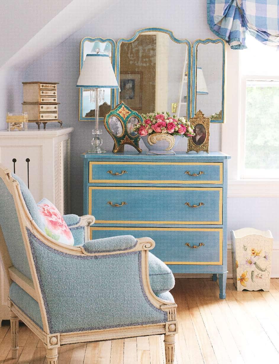 { Scale is one of the most important elements of design. A dresser and chair make this small corner live large.