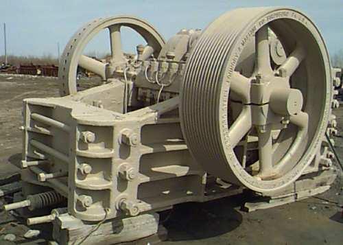 9 2.4.1 Jaw Crusher A jaw or toggle crusher consists of a set of vertical jaws, one jaw being fixed and the other being moved back and forth relative to it by a cam or pitman mechanism.