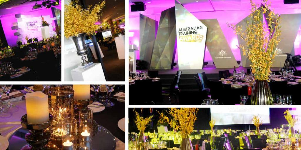 AUSTRALIAN TRAINING AWARDS Pedestals with custom decal graphics to brand the event. Huge floral arrangements of golden James Storey Orchids filled sleek silver urns.