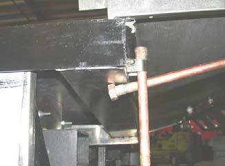 placed below gutter (figure 3) 4) Lower backsplash until