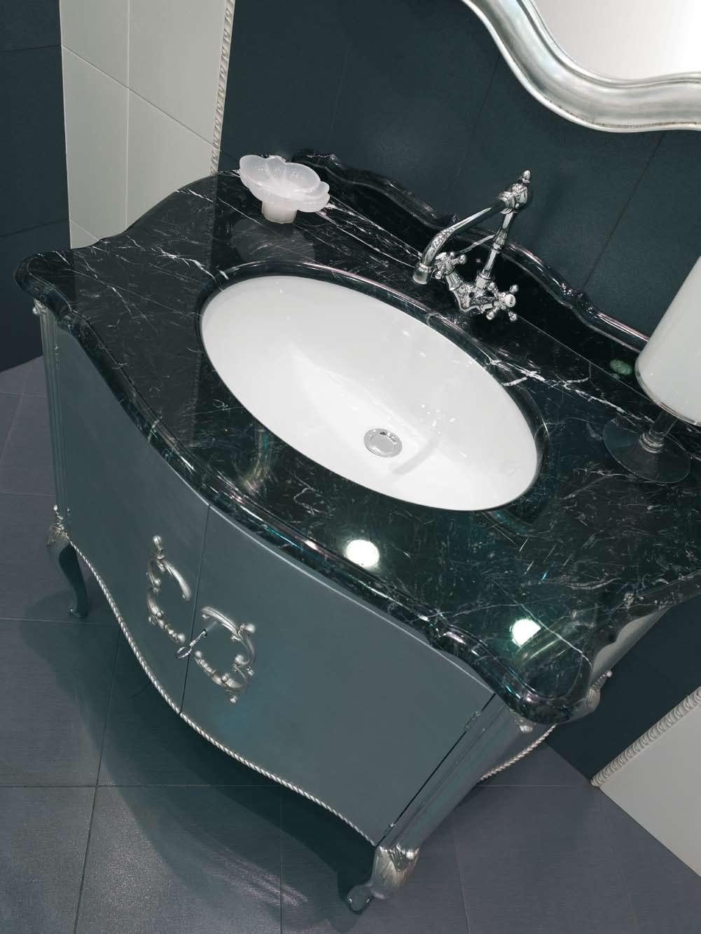 WASHBASINS PYRAMIS under-counter and inset washbasins play with the lines and the perspective of the bathroom, re-defining the
