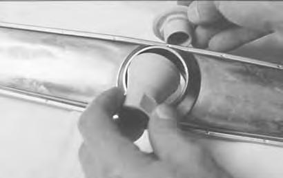Carefully press out the old bearing in each piece. 6. Press a new bearing in the hub and nut. DO NOT HAMMER THE BEARING IN PLACE. 7. Reassemble in reverse order. 8.