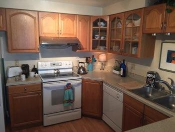 1. Kitchen Room Kitchen Walls and ceilings appear in good condition overall. Flooring is laminate. Accessible outlets operate.