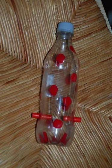Soda Bottles Hummingbird Feeder 4 parts boiling water to 1 part granulated sugar (no stronger) & never use