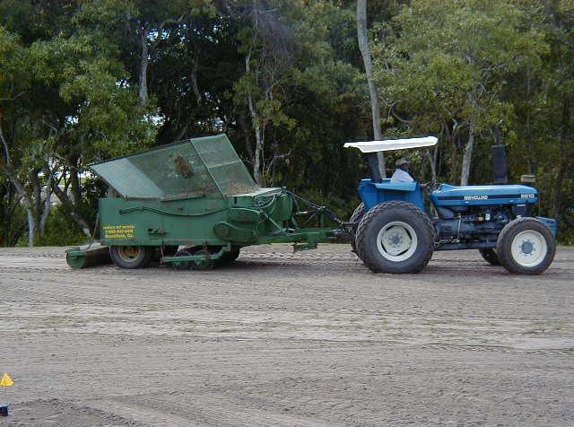 Equipment used to plant sprigs in rows. (Photo courtesy of Van Cline, Ph.D.) Typically 400-800 bushels of sprigs per acre are planted on a bare soil surface.