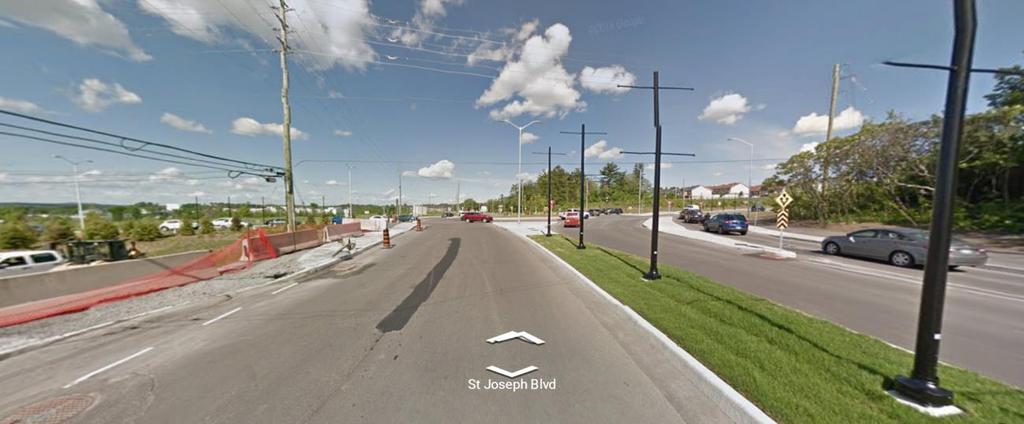Figure 13. View from St. Joseph Boulevard facing east towards the Old Montreal Road and Trim Road traffic circle 2.