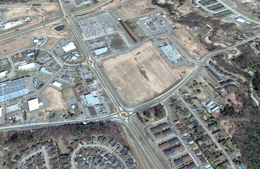 2. SITE AND SURROUNDING CONTEXT 2.1 Site The site is located in the northeast section of Orleans at the northeast corner of the Trim Road and Old Montreal Road traffic circle.