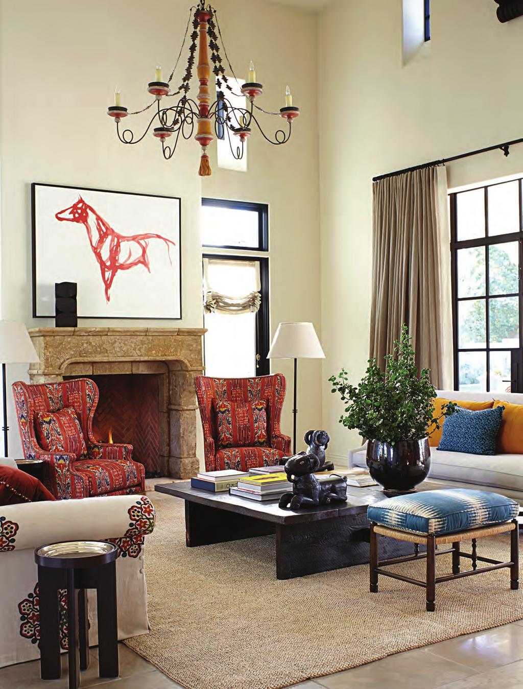 This photo: The patterned wing chairs in the great-room take their color cues from the sofa in the foreground.