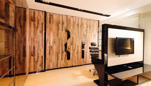 Closet wood-plank doors with visible grains contrast beautifully with mirrored and carved accents.