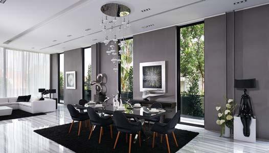 The ground floor takes on a cooler appearance with its black, white, and gray palette.
