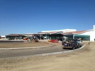 projects Apron Last pour Thursday then final crack sealing Phase II Parking Started paving, continue airport