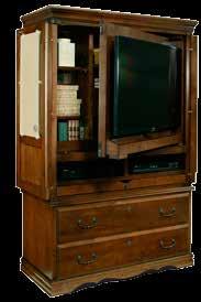 The Flat Screen TV Armoire features flat-back raised panel doors with articulated hinges that swing out of the way when you want them to.
