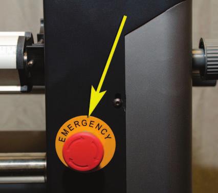 Four Emergency Stop (also referred to as E-Stop) Switches are available on the Laminator. The Emergency Stop Switches are located on all four upper corners of the machine.