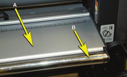 The Table incorporates an optional Idler on the leading edge (B). Figure 17. Pressure Plate on stand-off. To remove the Pressure Plate: 1.