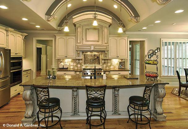 THE KITCHEN WITH AN ISLAND Both U-shaped and L-shaped designs can include an island when there s enough space to warrant it, expanding the kitchen s usability with more workspace, eating space and