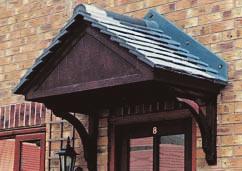 Quality GRP Overdoor Canopies Shown with fully stained GRP soffit & brackets The Carisbrooke Closed gable tiled