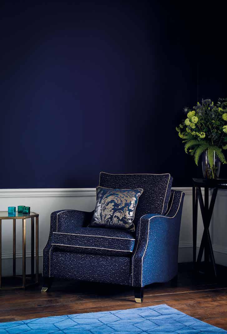 The Amelia chair, with its contrast piping, is luxuriously decadent