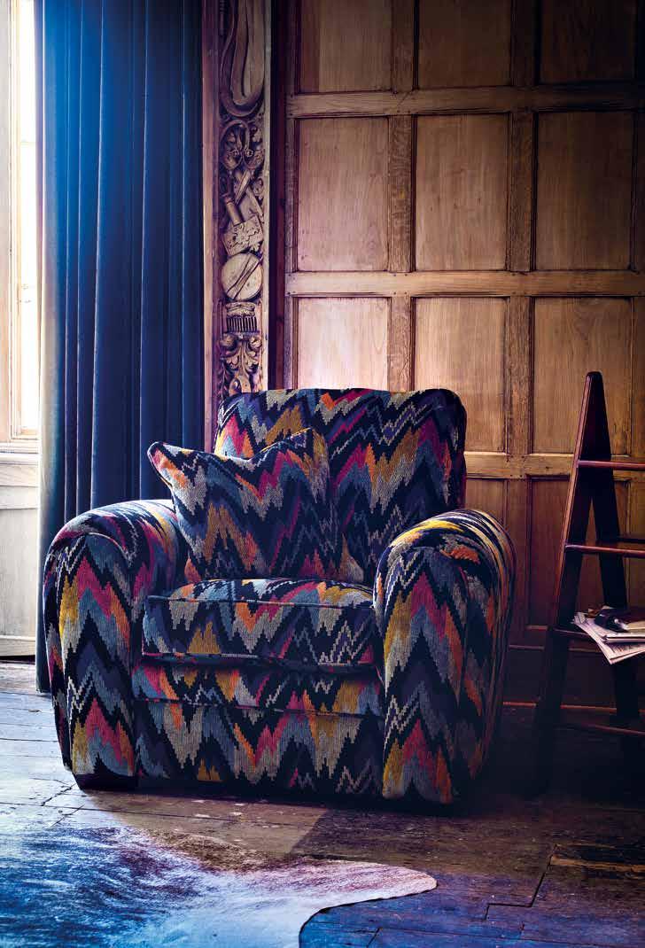 The Spitfire chair in Holbein, with matching cushion, has a bygone air, and will be as comfortable in years to come as