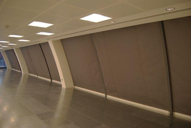 provide a range of ceiling interfaces and can even invisibly conceal the barriers in the ceiling