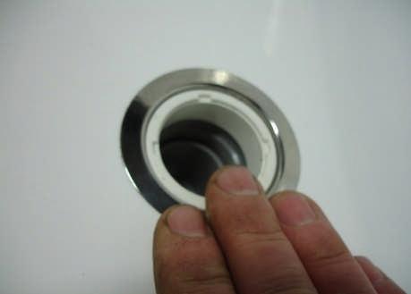 BE NO BURR ON EDGE OF HOLE, a burr could stop the mounting flange sitting down flush Apply an adequate amount of silicone to front flange of body Locate flange and stainless steel