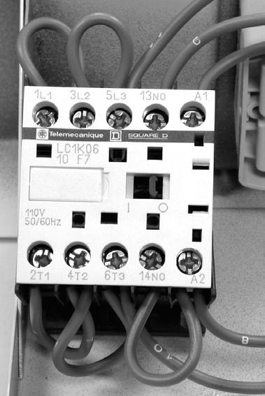 NOTE: Sharp edges may be present. 1. Disconnect the power to the drying cabinet. 2. Remove the component panel (see page 4-2 for the procedure). Rotate Bottom Of Relay Case Up 5.