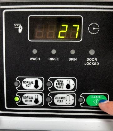 10. Turn the dial to select normal, warm wash. See Figure D. Figure D 11.