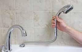 Using Your Diverter and Shower Hand Spray 1. Lift your hand spray UP then pull OUT towards yourself.