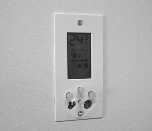 Figure 2-12: Flush mount thermostat 8. Snap the flush-mount thermostat skin into place on the thermostat.