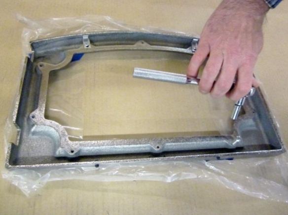 Shipping Latch 9/16" Wrench Door Retainer 2. Place the door shell face down on a non-scratching surface.