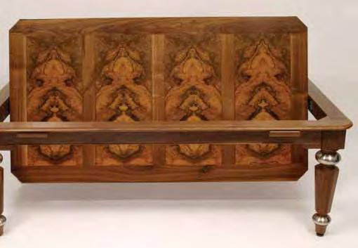 hand carved edges. Bentley Roll-over in walnut with burr walnut panels and hex and steel legs.