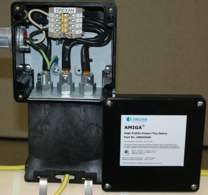 (junction box) with terminal blocks mounted on DIN rail.