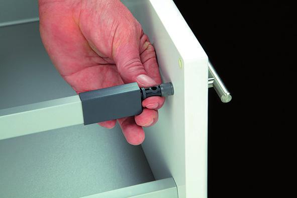 Adjust drawer or pull-out front panel (ArciTech champagne-coloured) First remove the plastic cover caps from both sides. No tools are needed to do this.
