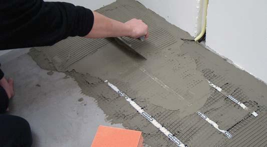 spread the tile cement that oozes through the mat (fig 12).