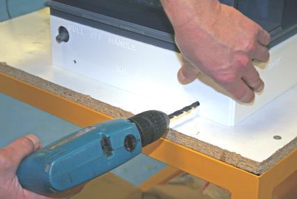 You will therefore need to drill holes in the base of the Rota-Spray, using the 7.5mm drill bit, together with the Drill Template provided. A) First place the Rota-Spray on a flat surface.