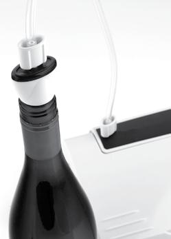Connect one end of the Vacuum Seal Hose to the Vacuum Seal Hose Port and the other end to the Wine Stopper in the wine bottle; ensure connections are pushed