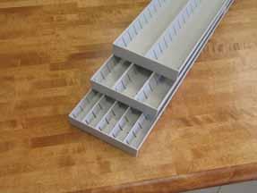 CABINETS: Drawer Features & Accessories CABINETS: Drawer Features & Accessories Plastic Groove Trays and Dividers Available in three sizes Store and separate elongated items Trays take up one-fifth