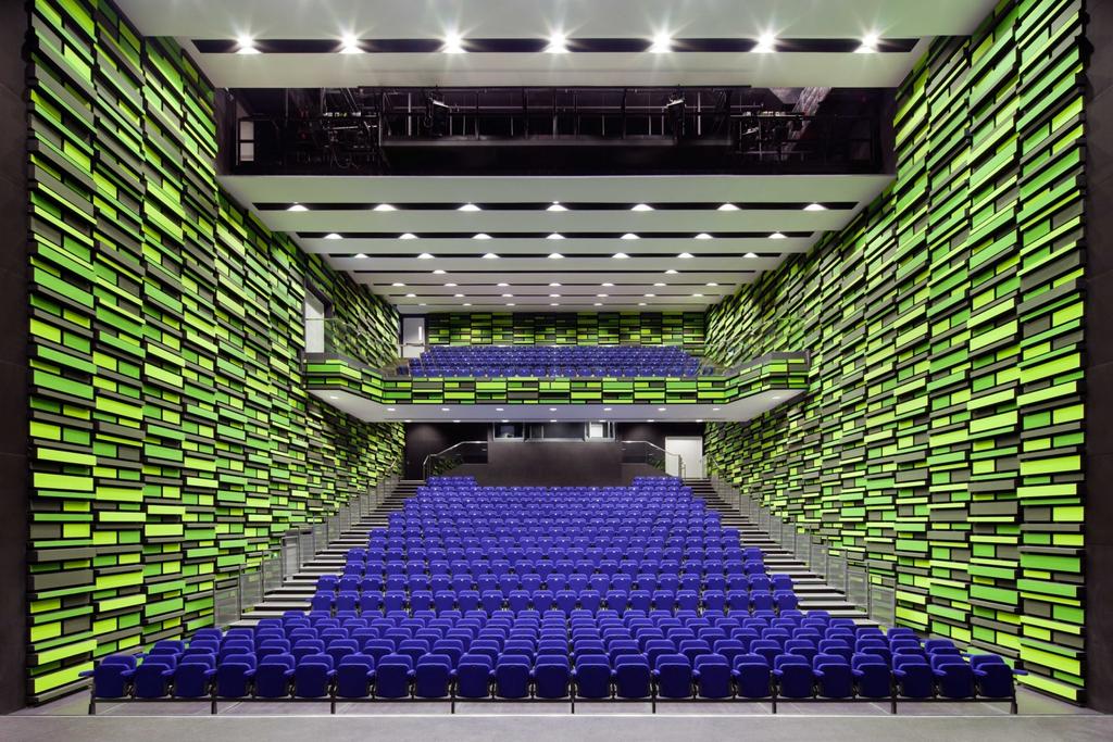 A NEW AUDITORIUM Use of retractable seats provide flexibility in the