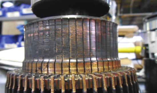 Figure 24 Commutator Wear Commutator will wear within brush contact area causing a deep lip at the outer surface NOTE: If pitting or wear on the commutator is found, remove the motor from service and