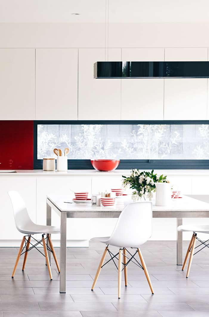 real homes long, linear window = splashback with a view writer & styling clair wayman photography james geer Sleek style Natasha loves the spacious and contemporary kitchen, with its red splashbacks