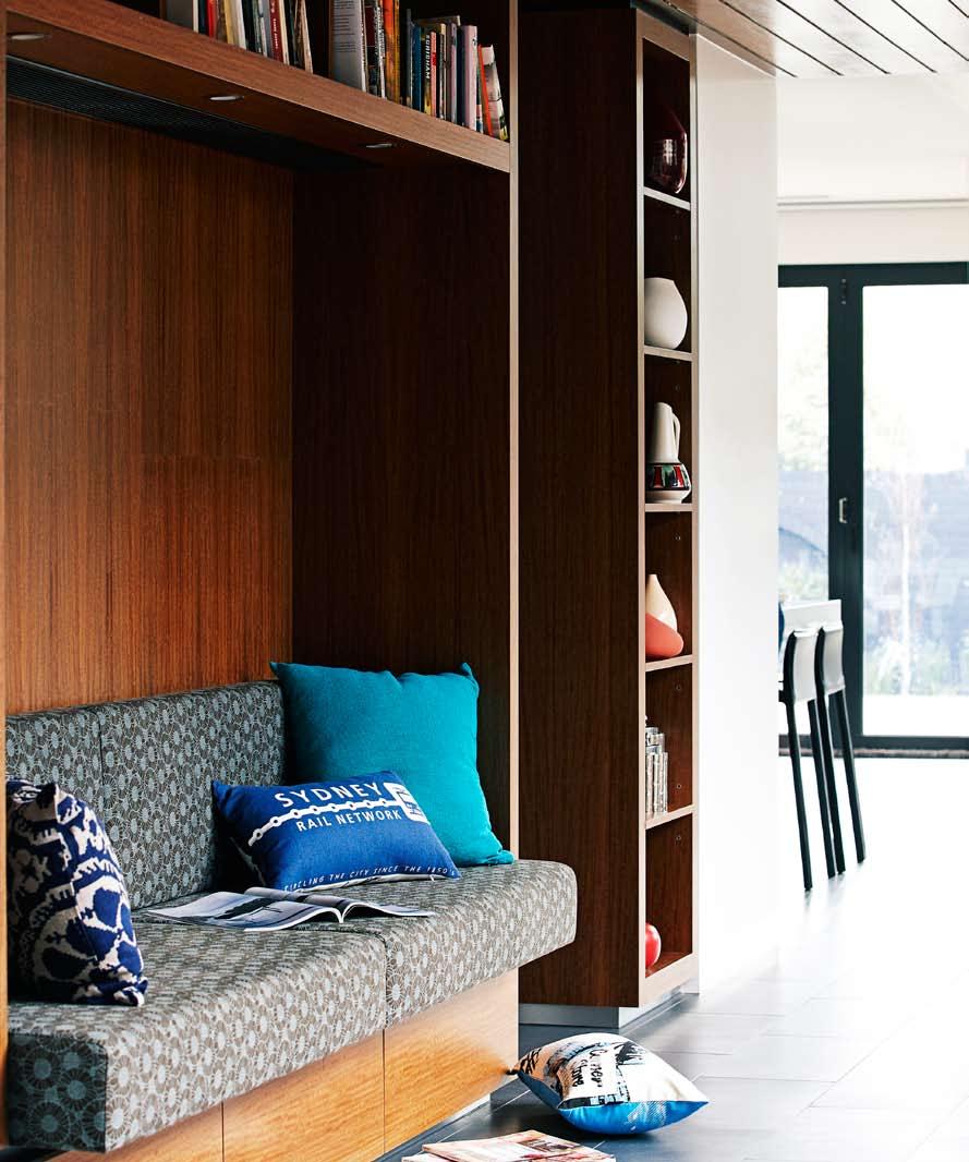 timber cabinetry adds a warm contrast to the fresh white walls comfy seating & clever storage Book nook Natasha s favourite spot is the built-in reading nook, which looks out onto the main courtyard